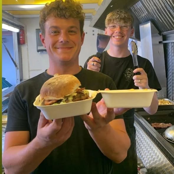 Alex and Luke with a Badass BBQ burger