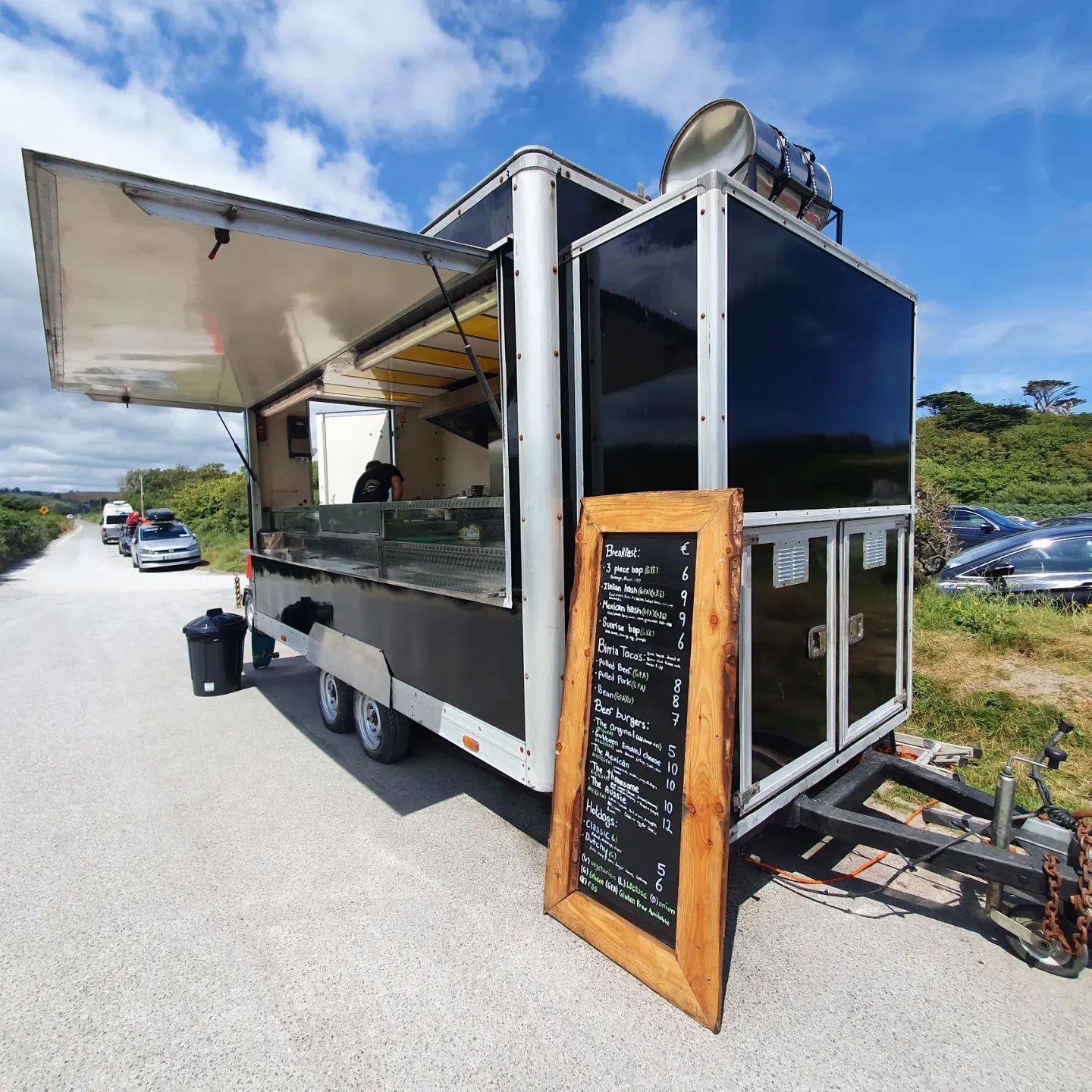 The Badass BBQ food truck with menu board